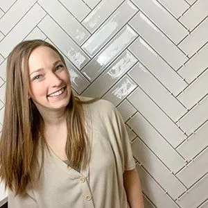 woman in front of shower wall