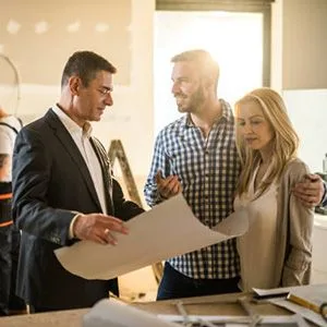 couple talking to remodeling contractor