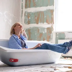 woman thinking about remodeling project