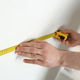 Measuring bathroom wall
