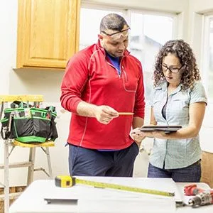 homeowner talking to contractor