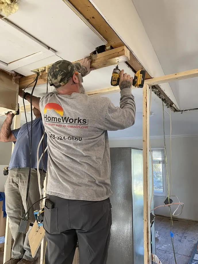 HomeWorks employee working on interior carpentry